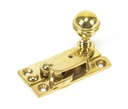 Polished Brass Prestbury Sash Hook Fastener in-situ