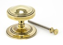 Aged Brass Art Deco Centre Door Knob in-situ