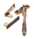 Polished Bronze Night-Vent Locking Reeded Fastener in-situ