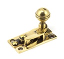 Aged Brass Prestbury Sash Hook Fastener in-situ