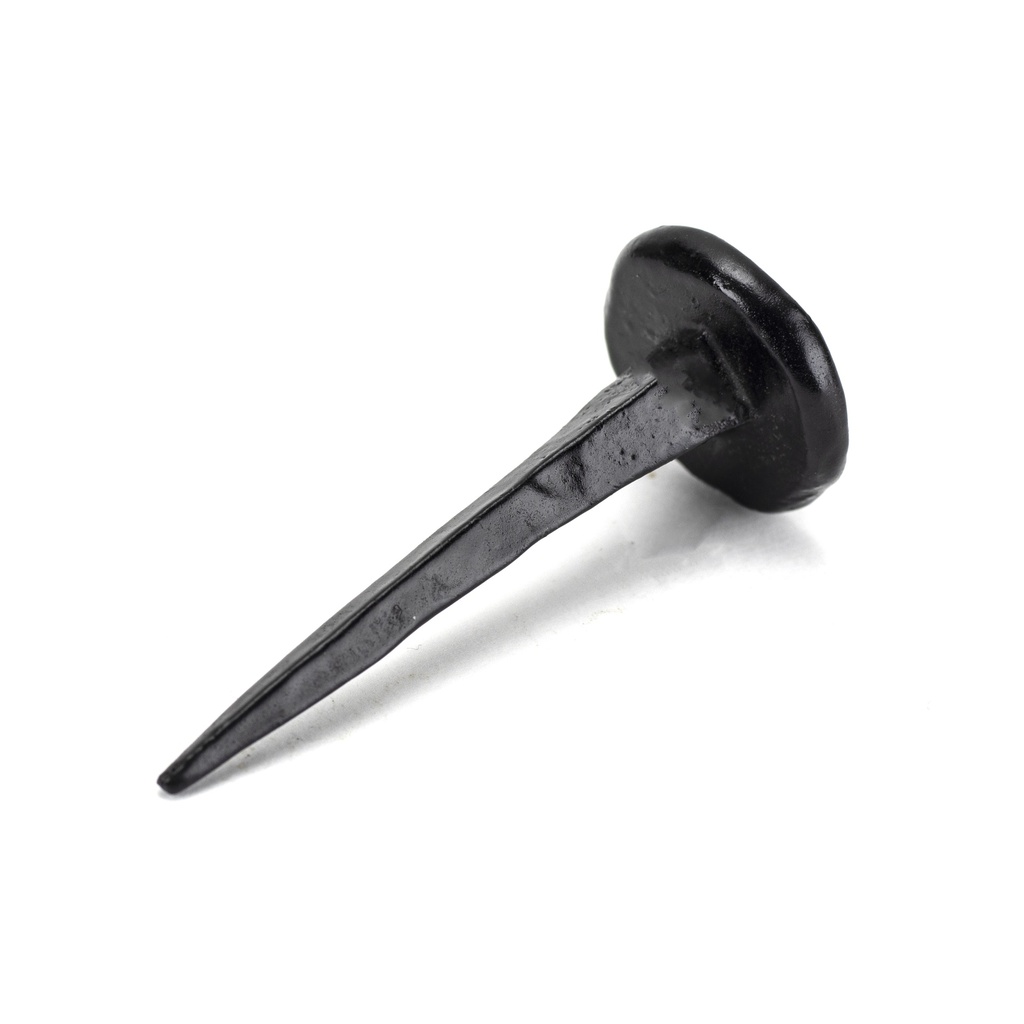 Black 2" Handmade Nail in-situ