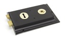 Polished Brass Rim Lock & Cover in-situ