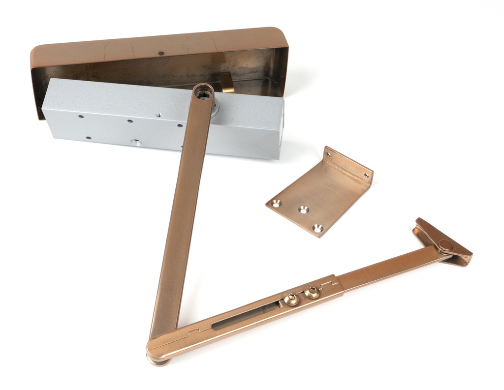 Polished Bronze Size 2-5 Door Closer & Cover in-situ
