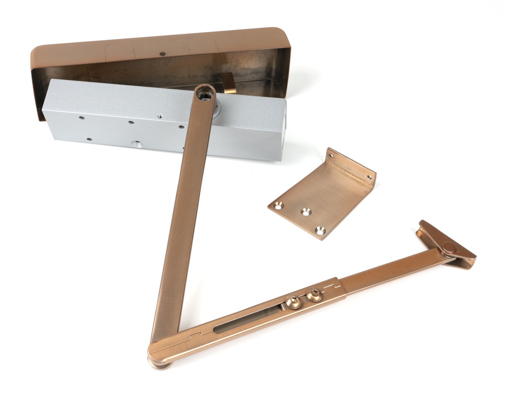 Polished Bronze Size 2-5 Door Closer &amp; Cover in-situ