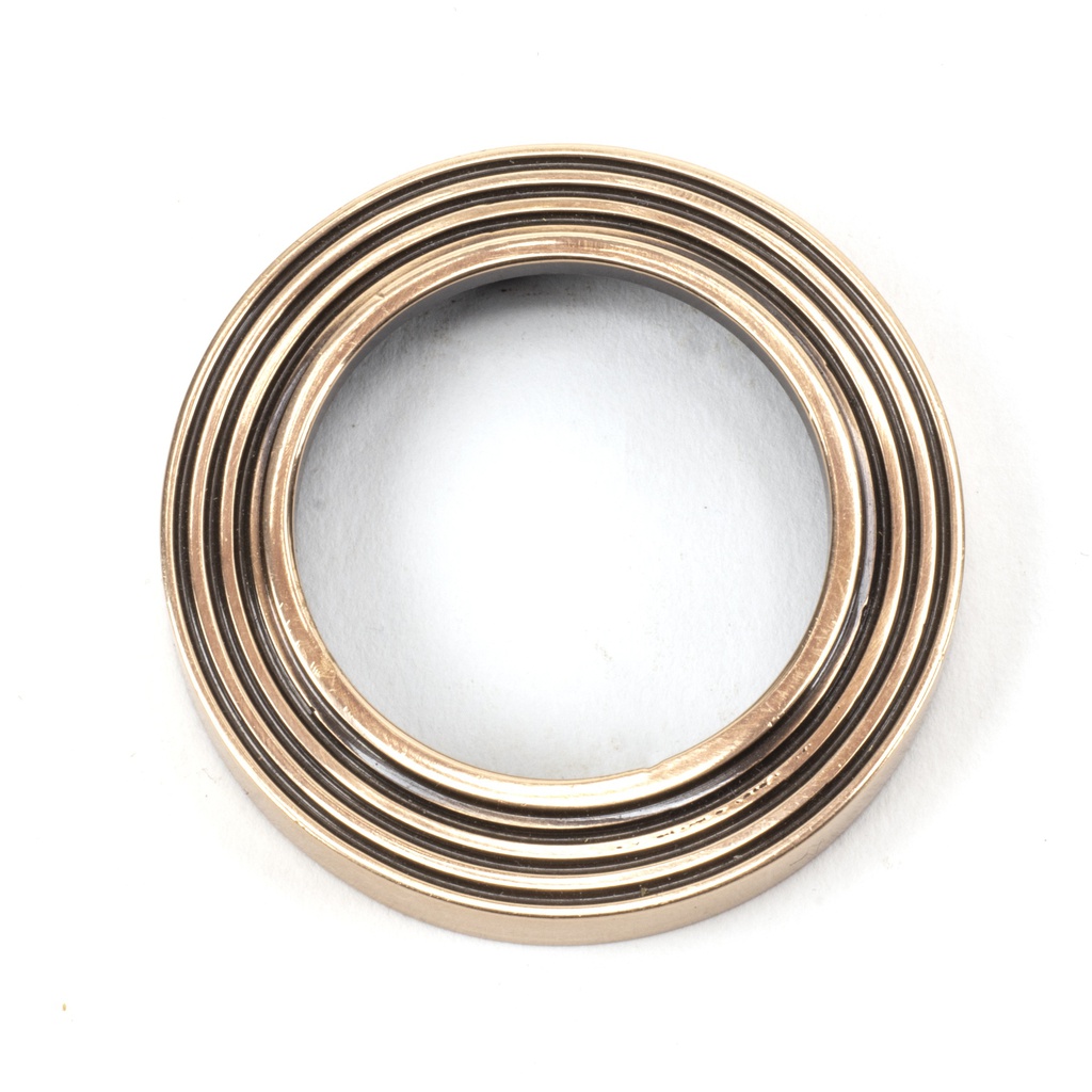 Polished Bronze Round Euro Escutcheon (Beehive) in-situ