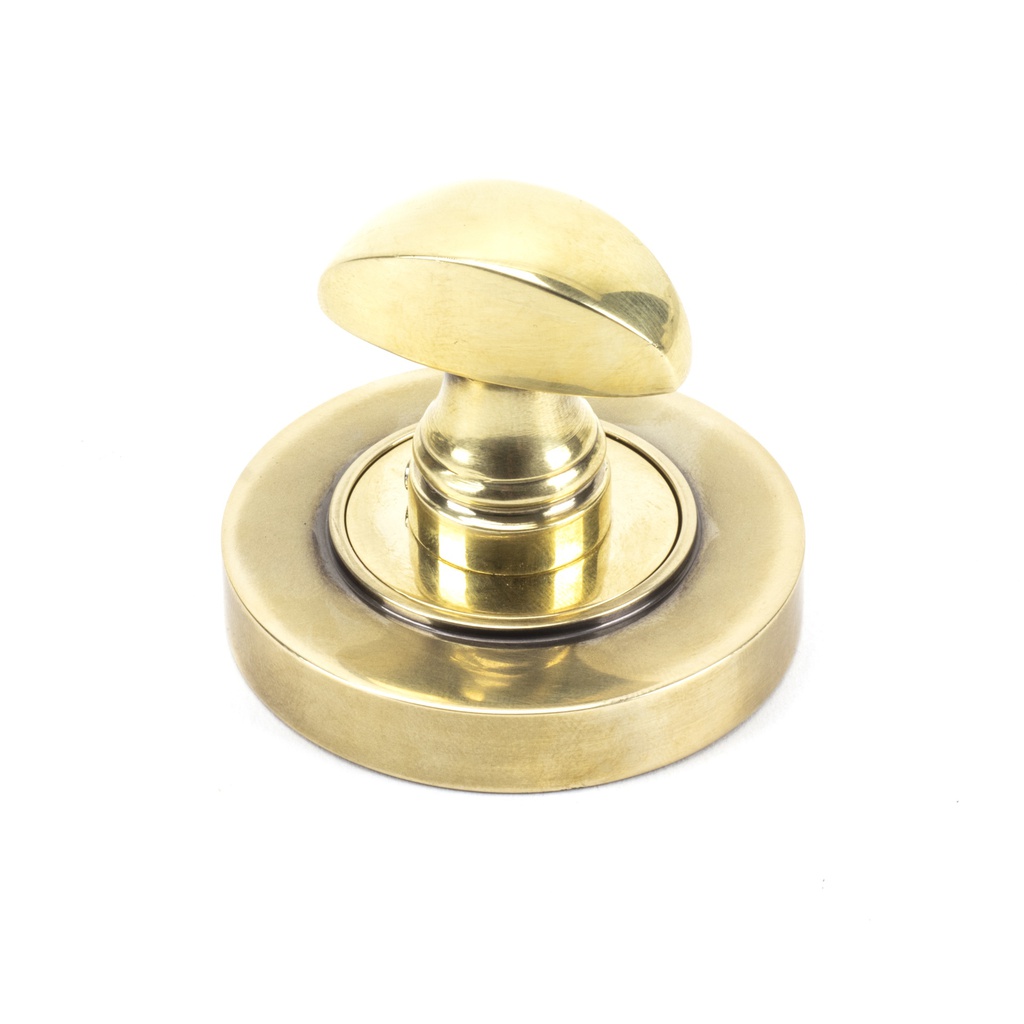 Aged Brass Round Thumbturn Set (Plain) in-situ