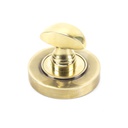 Aged Brass Round Thumbturn Set (Plain) in-situ