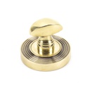 Aged Brass Round Thumbturn Set (Beehive) in-situ