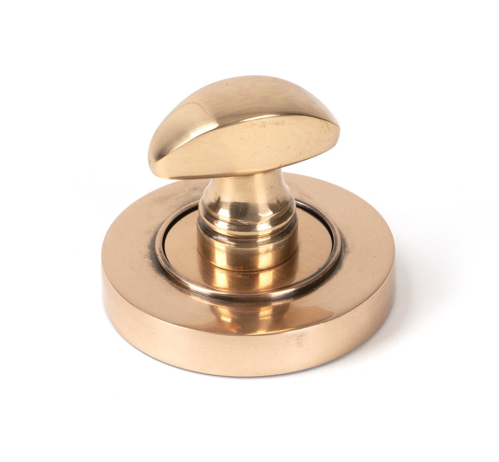 Polished Bronze Round Thumbturn Set (Plain) in-situ